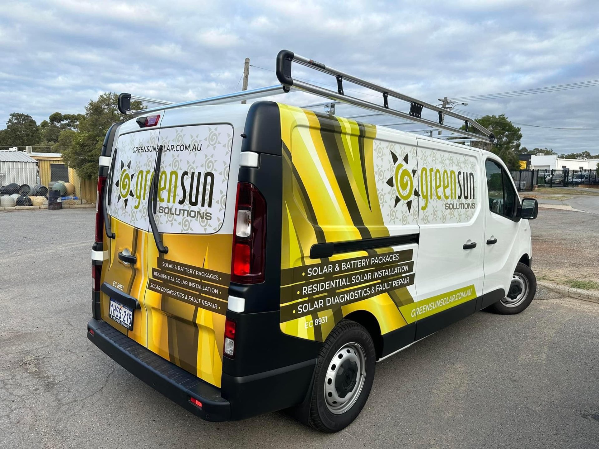 Green Sun Solutions vehicle fleet outside the warehouse